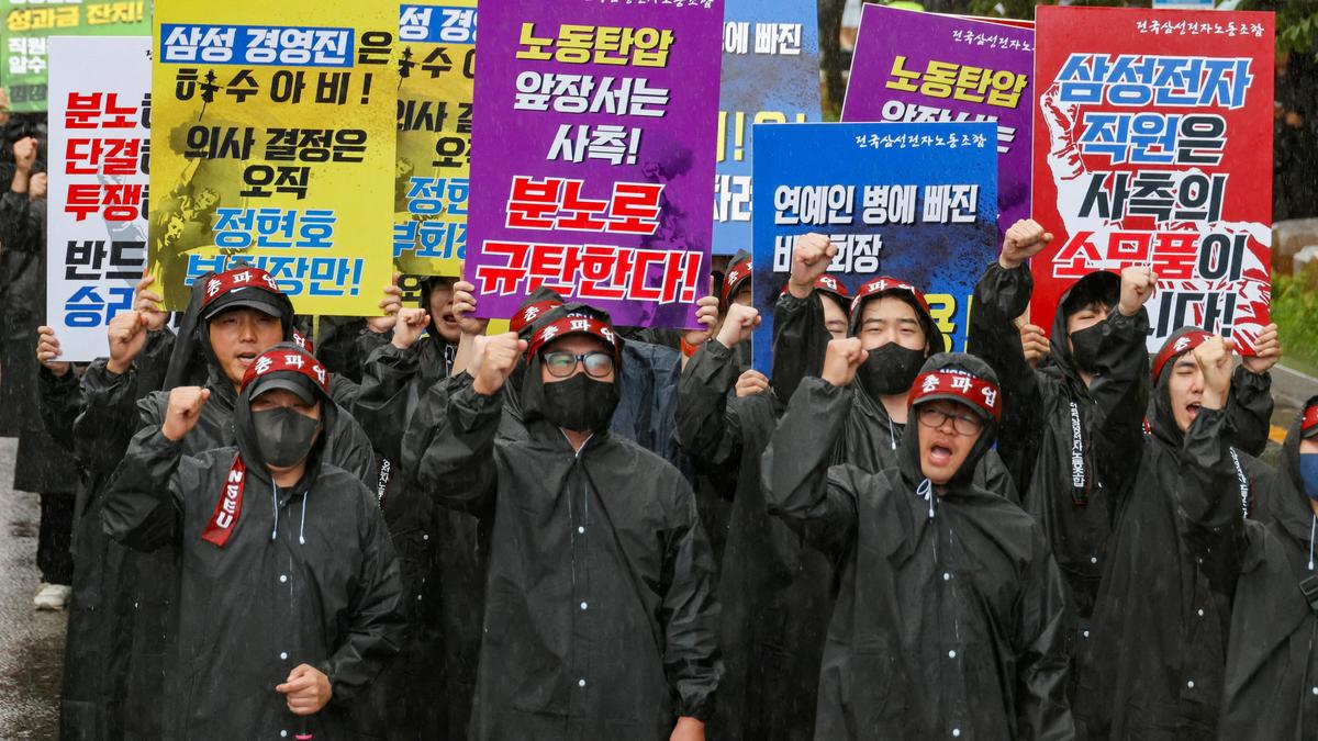 Samsung workers rally in South Korea, demanding higher pay, threatening to strike