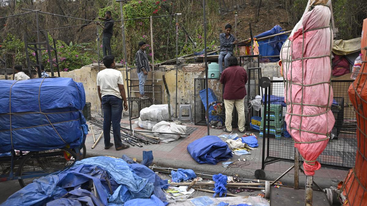 GHMC faces resistance from shop keepers during demolition drive near Monda Market