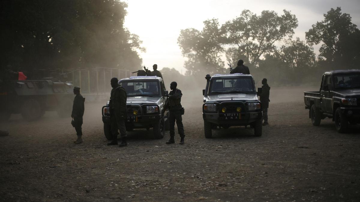 Loud blasts, gunfire heard near Mali’s main military camp, witness says